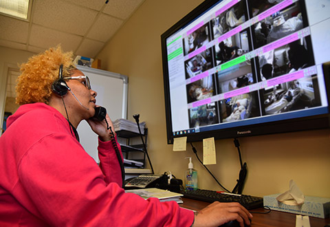 A Cincinnati VA employee monitors Veterans in the ICU via the Virtual Telesitter Solution. A Cincinnati VA employee monitors Veterans in the ICU via the Virtual Telesitter Solution.