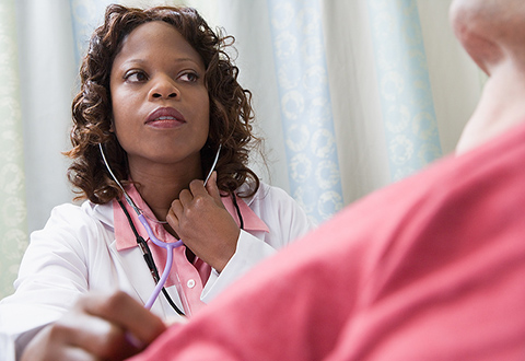 Nurse checking patient