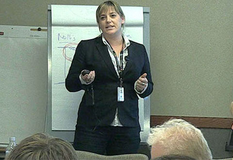 Kristen Miller, Dr.P.H., NCPS patient safety fellow, teaches a class on VA patient safety to VA caregivers.